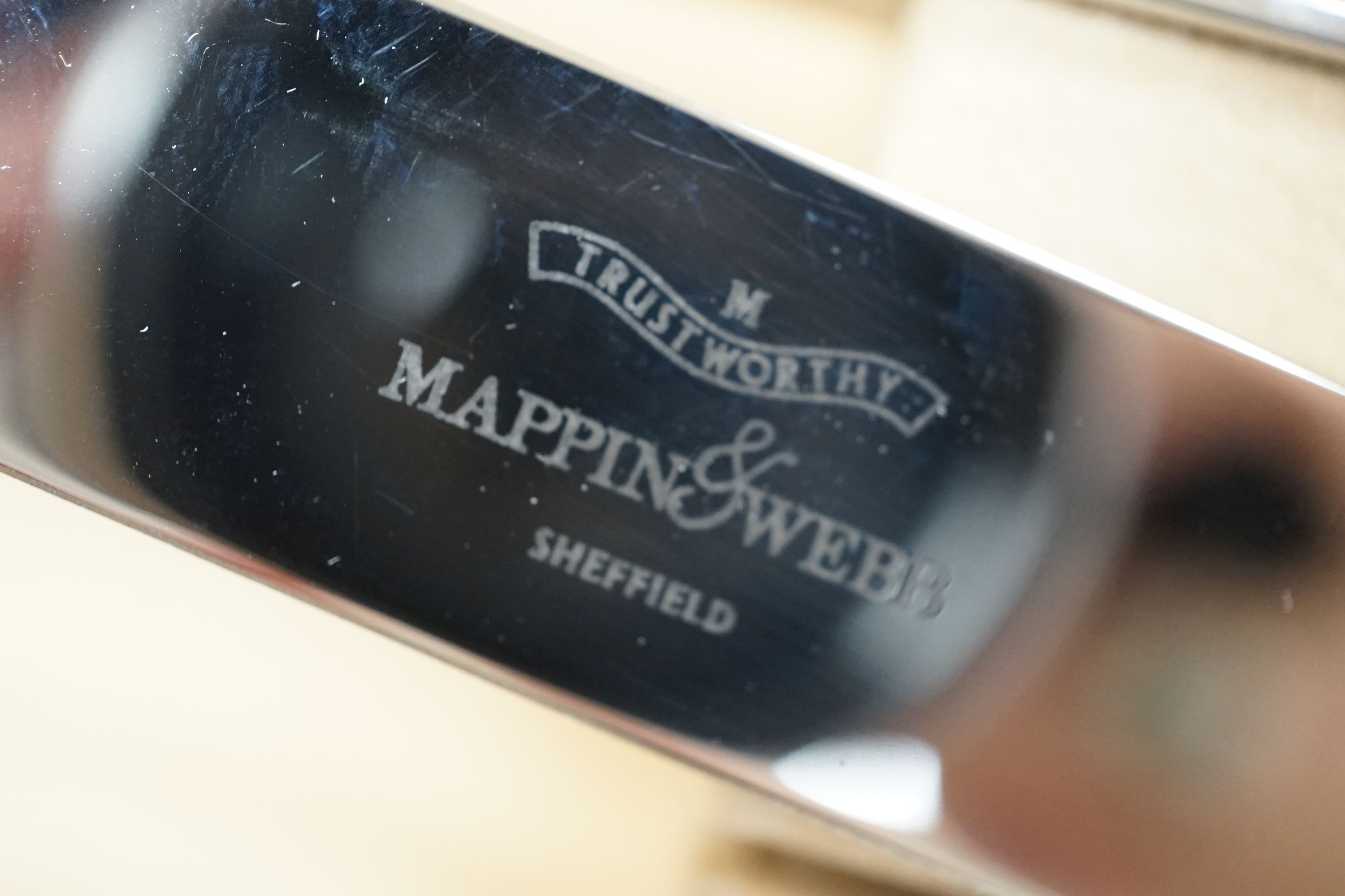 A cased modern silver forty four piece canteen of King's pattern cutlery by Mappin & Webb, Sheffield, 2004, weighable silver 76oz.